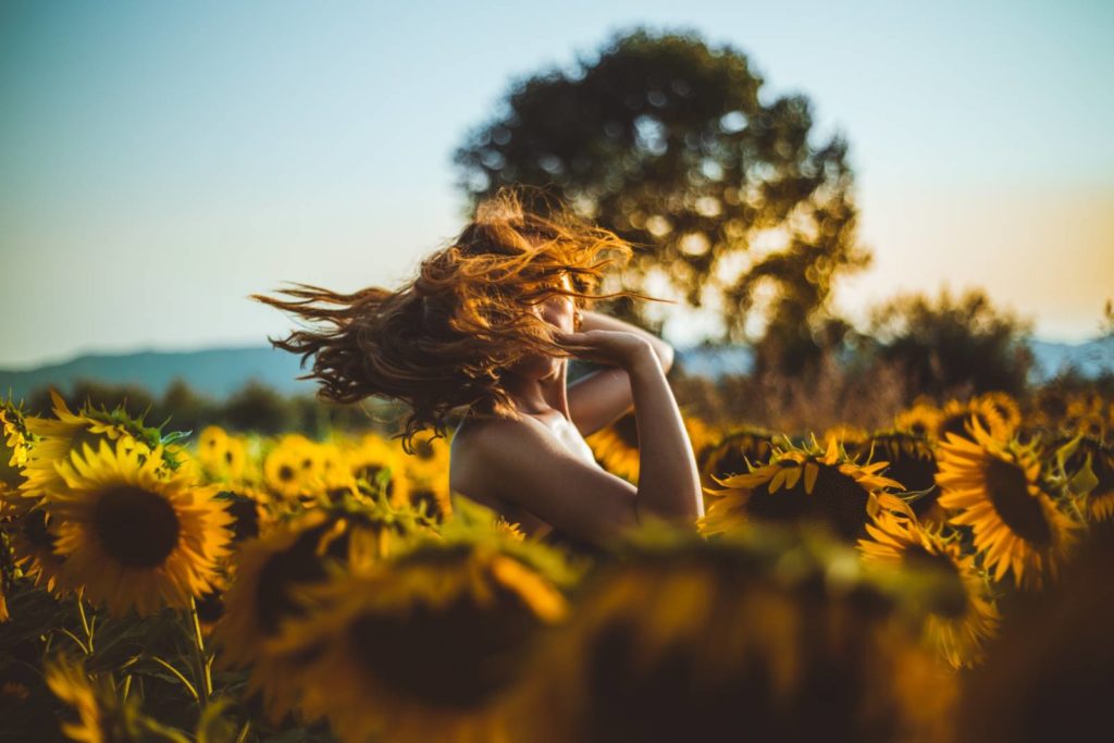Girl in Kansas sunflower field