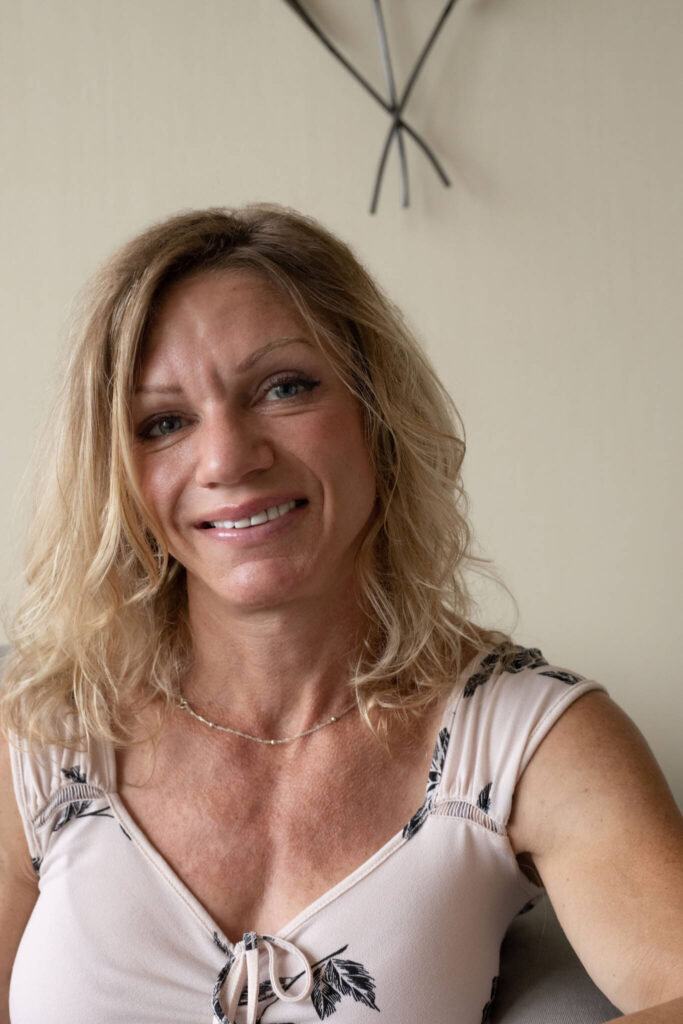 Psychologist Jennifer Voth Sitting in Therapy Office